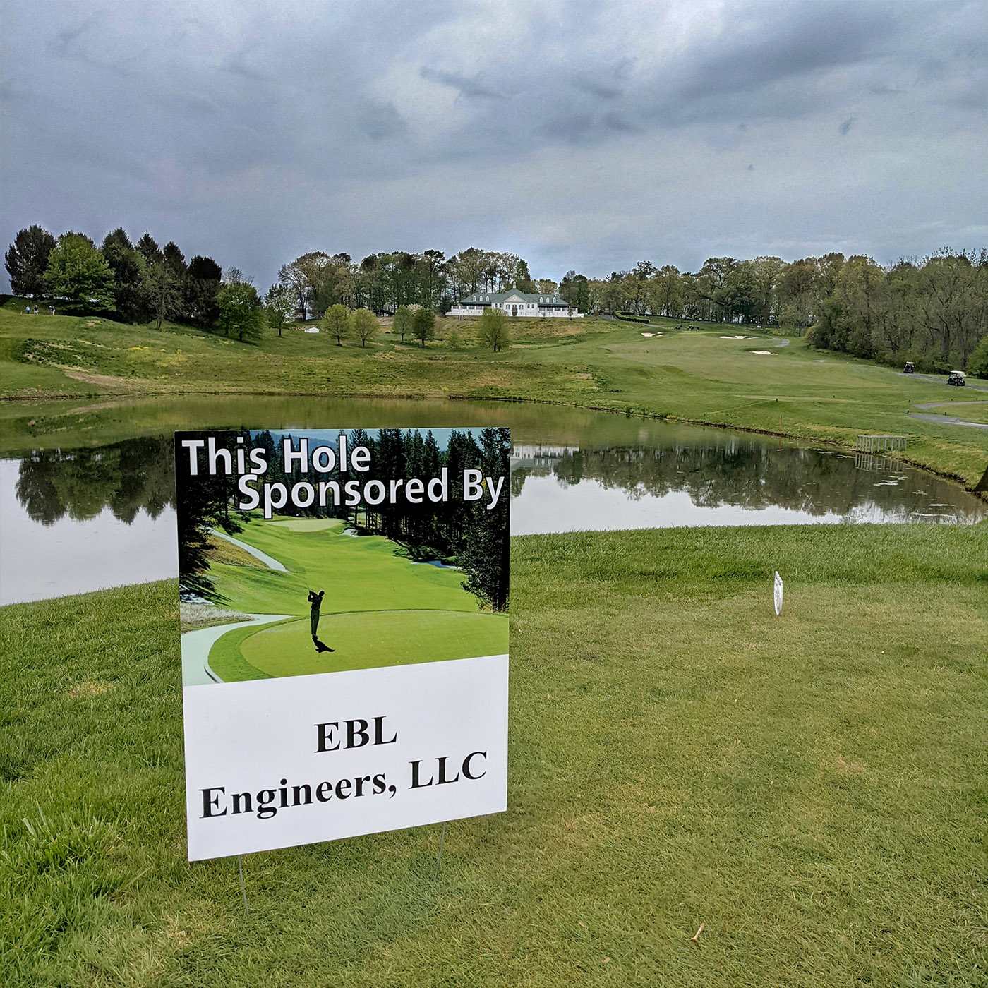 Image of sponsor sign on golf course